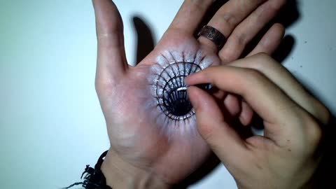 Artist Creates A Hole In His Palm For The Sake Of Art