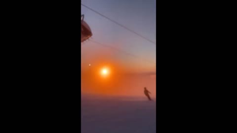 Hazy sunset makes for spectacular evening skiing sessions