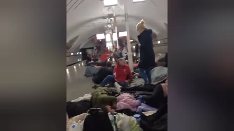 Ukrainians hiding in the subway from the bombing . Russia attacks Ukraine