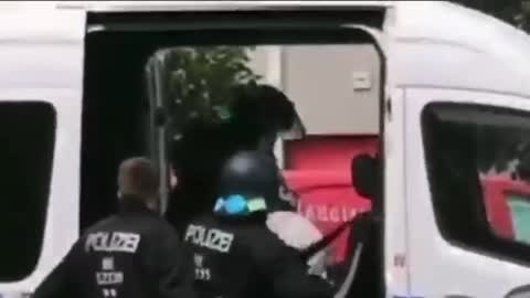 German police beating a man half to death for refusing to wear a mask