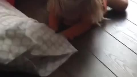 Blonde haired girl falls off chair in slowmotion and screams
