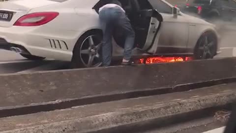 fire in a luxury car