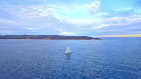 Sailing boat near the coast