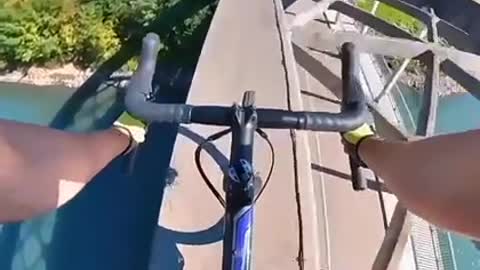 Beautiful Cycling Videos Climbing on bridge.