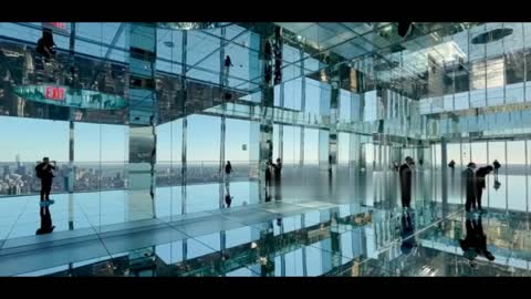 New York's new tourist attraction features dizzying glass-bottomed mirrored 1,000ft observation deck