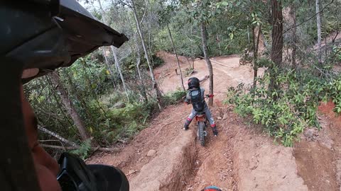 Glasshouse mountains Enduro 12 year old sending it with dad