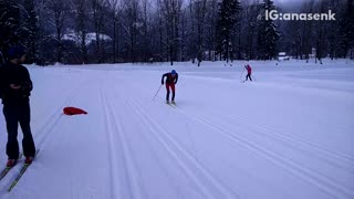 Guy red suit green skis falls forward front flip fail