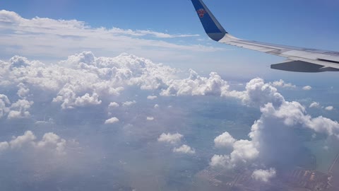 Sky and cloud footage from the plane.