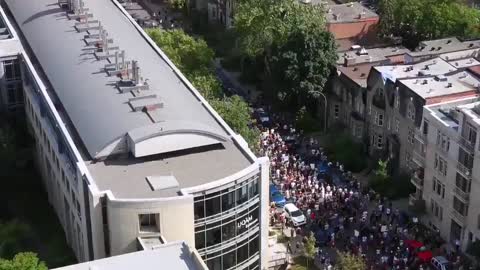 Large protest against the domestic vaccine passport in Montreal, Quebec, Canada.