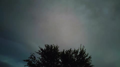 Timelapse of cloud movement in the night sky.