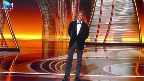 Watch the uncensored moment Will Smith smacks Chris Rock on stage at the Oscars, drops F-bomb