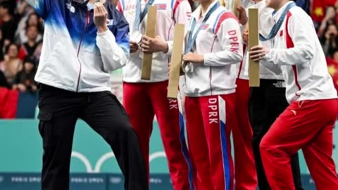 North and South Korean Team Pose For Selfie Together at Olympics 2024