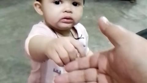 Cute baby girl eating some food