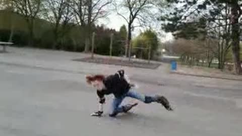 Guy rollerblades for the fist time and falls on concrete floor