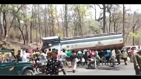 Villagers near the accident of a fuel tanker in India rushed to grab the oil after hearing the news