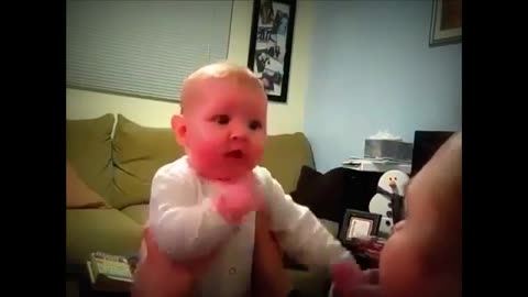 baby's reaction there to hear ..very funny