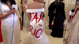Ironic AOC Wears "Tax the Rich" Dress at 30k Met Gala