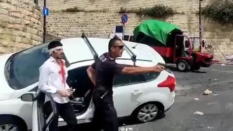 JERUSALEM : A JEWISH DRIVER WHO LOST CONTROL OVER HIS CAR AFTER STONES WERE THROWN AT HIS VEHICLE