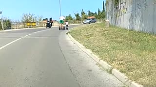 Risky Place to Tow a Kids Bicycle