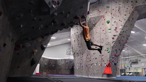 Young Boy Climbing At Gravity Vault Upper Saddle River