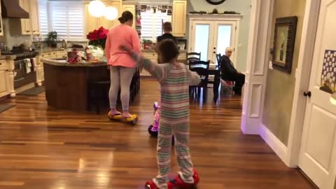 Girl does a long spin on hoverboard and faceplants