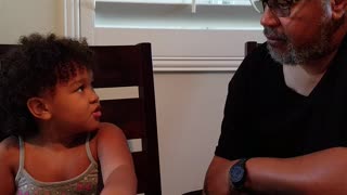 Little girl gives grandpa stern counseling