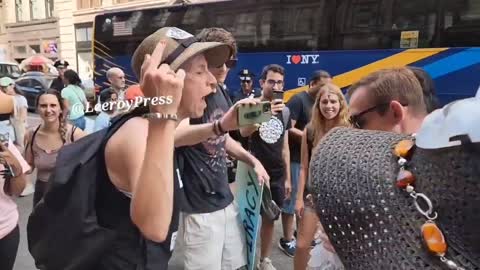 A man Eats Bacon infront Animal activists in New York and Drives them Crazy