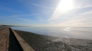 Sound of a calm sea on a sunny day.