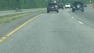 Alaskan Motorists Use Caution When Following an Erratic Driver on Freeway