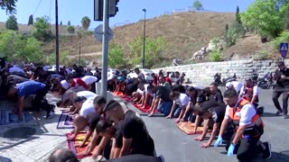 Worshippers pray outside Al-Aqsa amid Israeli curbs