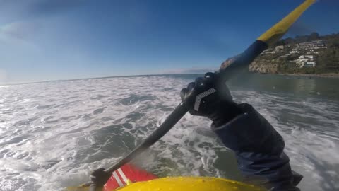Surfing ocean waves in a kayak!