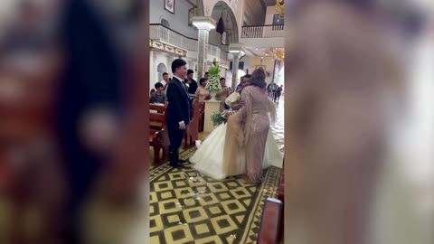 Filipino couple braced flood waters on wedding day