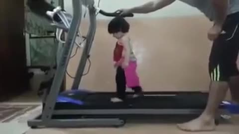 Baby and running machine
