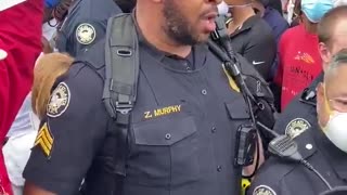 Atlanta police officer speaks to protesters