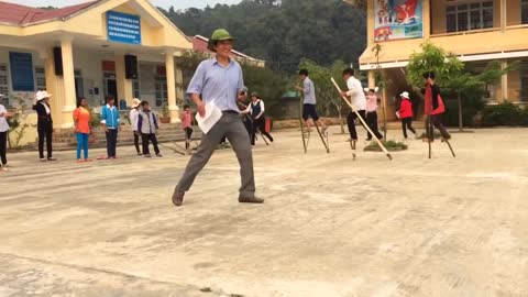 Stilt walking -Traditional folk games of Vietnamese