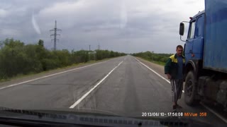 Driver Dodges Wheel that Breaks From Truck