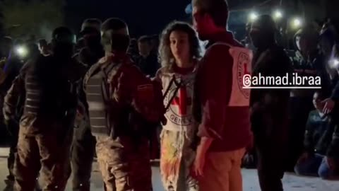 Footage of Hamas and Red Cross employees while the hostage transfer.