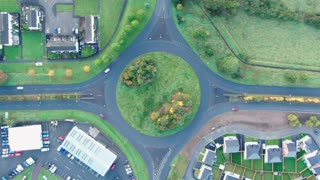 Time Lapse Birds-eye View Of A Roundabout Road System