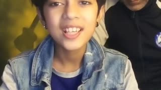 Cute boy singing