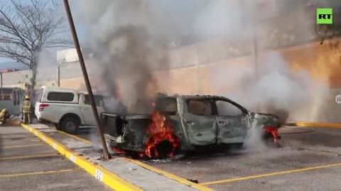 MEXICO: Raging protesters torch govt building and cars over 43 missing students!