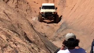 FJ Cruiser tips on side at Hell’s Gate