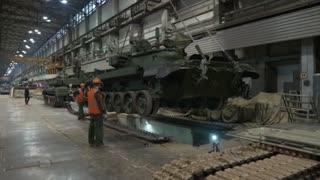 Russia's former President Dmitry Medvedev visits tank factory