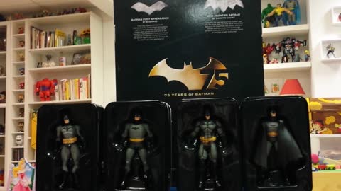 Opening box of Batman 75th Anniversary Action Figure Collectibles