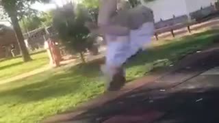 Kid in white shirt backflip faceplant