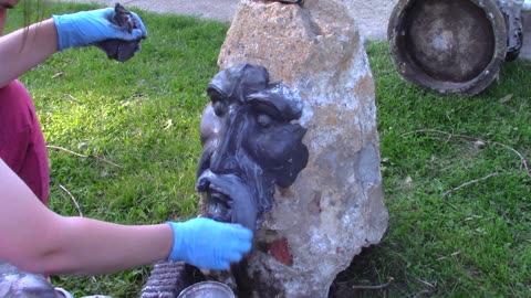 Sculpting a Face on a Hunk of Concrete