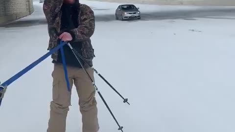 Texan Skis Down Highway With Beer and Cigar