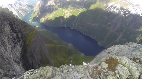 Dangerous wingsuit flying over stunning Norway