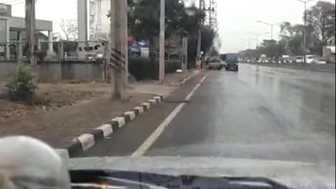 Car Spins Out at Busy Intersection