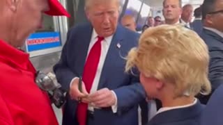 Trump Signs $20 Bill For Young Boy At Philly Cheese Steak Pit Stop