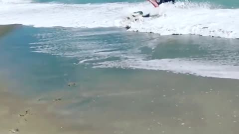 Navy blue skimboard fail